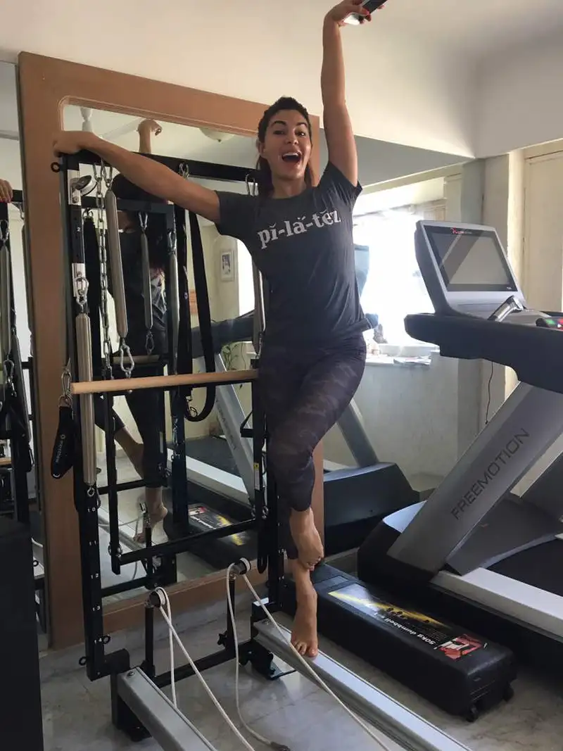 Jacqueline Fernandez | iLogo Jacqueline Fernandez in a charcoal Pilates T-Shirt of radhika balanced body - Delivered in